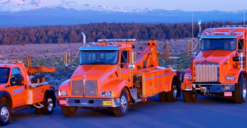 3 tow trucks from Consolidated Towing in Bend, Oregon